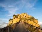 Italy-Tuscany-Civita di Bagnoregio Evening view of the bridge Art Print